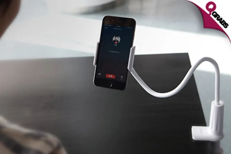 From QR29 Go Hands-Free with a Universal Flexible Mobile Phone Holder - Your choice of 2 Colors! (Up to QR130 Value)